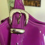 Ted Baker bag in beautiful purple. floral lining with snap closure Photo 1