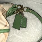 Coach  hobo-style crossbody purse, beige signature with green leather trim. Photo 4