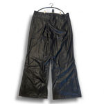 BLACK FAUX LEATHER DIP WAIST FLARED PANTS US Size 20 NWT PRODUCT DETAILS Consider these your after-dark essential. These black faux leather pants redefine after-dark dressing with a contemporary edge. The dipped waist detail introduces a subtle architectural element, enhancing the flared silhouette. Crafted from a quality faux leather, they offer a refined alternative to traditional pants. Style yours with a sharp-shouldered blazer and delicate jewelry for an empowered, yet considered evening look. Length approx 86.5cm/34" (Based on a sample size UK 8) Model wears size UK 8/ EU 36/ AUS 8/ US 4 Model Height - 5ft 7" Brand: PrettyLittleThing Category: Co-ords Product type: Flared Color: Black Design: Plain Occasion: Evening Product code: CMT1931 Photo 6