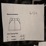 WETHEWEARWHAT Black Faux Leather Buckle Pleated Mini Skirt Size 6 Photo 8