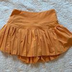 Hinge Orange Gold  Tennis Skirt Photo 0