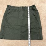 G1 Goods Green Mini Skirt Size 0 flaw missing button Photo 2