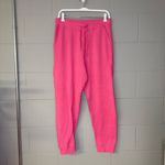Nike  Yoga Luxe 7/8 Fleece Jogger Pants in Pink Women’s Size Large Athletic Pants Photo 1