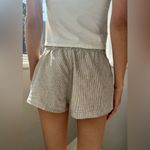 Brandy Melville  NWT Tan & White Pin Striped Linen Shorts. Women’s One Size Photo 1