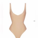 SKIMS Body Unlined Plunge Thong Bodysuit small clay NWT *dust marks* Photo 8