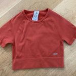 Lilia's Active Ribbed Knit Crop Tee in Sunset Photo 0