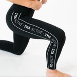 Zyia  Active Striped Logo Light N Tight 7/8 Leggings Size 2 Photo 1