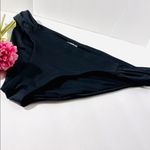 Becca  black bikini bottoms. Photo 3