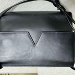 Vince Signature V Baby Crossbody Bag
Black Leather Photo 1