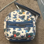 Lounge Fly  Blue and Cream Character Print Wristlet Photo 0