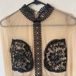 Agaci tan and black sheer long sleeve mini dress with embroidered detail Photo 4