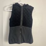 The North Face  black reversible black quilted hooded vest size small Photo 4