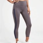 Athleta  Ultimate Stash Pocket 7/8 Tight leggings in a grey/mauve color XXS Photo 1