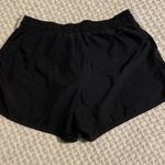 Nike  womens dri fit black and white running shorts size S Photo 5