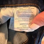 Wrangler  Premium Mid Rise Bootcut Jeans Size 13x34 Photo 3