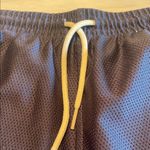 Tracksmith Women’s navy Van Cortlandt “Grande” running short. Blue Photo 3