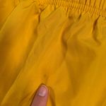 Nike  Women's Vibrant Yellow Athletic Shorts Photo 9