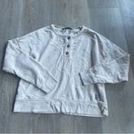 Carhartt  WOMEN'S TENCEL™ FIBER SERIES LOOSE FIT FRENCH TERRY HENLEY SWEATSHIRT Photo 1