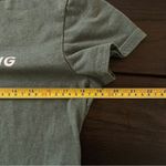 SheIn green large shirt sleeve tshirt I may be wrong but it’s highly unlikely Photo 1