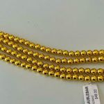 BaubleBar Apple Watch Band Gold Beads from Nordstrom Stretchy Band Photo 1