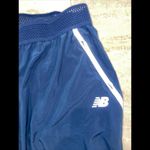 New Balance  NBdry Pants Women  Lightweight Track Jogger Ankle Tapered Blue Large Photo 1