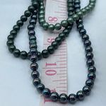Boutique Three strand faux pearl layered necklace. Adjustable and easy. Photo 6