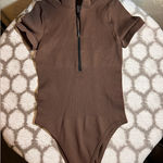 Bodysuit NWOT Brown Bodysuit Ribbed Zip front Short Sleeve Small Photo 0