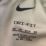 Nike  One Dri-FIT Ultra High-Waisted 3-inch brief-lined shorts in an olive green Photo 2