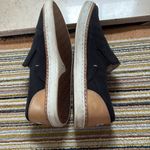 UGG  Black and Tan Slip-On Loafers Photo 1