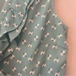 ⭐️Romy light teal blue sleeveless blouse with dandelion print and ruffles medium Photo 10