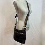 Coach Black Crossbody Bag with Adjustable Strap and Medium Size Photo 1