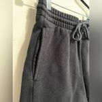 Aritzia ARITIZIA TNA Black Cozy Fleece Sweatshorts Drawstring Pockets Women’s Sz S EUC Photo 1