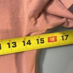 Vans  XS long sleeve crop top logo shirt on peachy tone. Photo 7