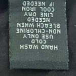 Torrid -BLACK LACE PANTS-SIZE 1 Short Black lace flare leg pants with attacked black shorts, excellent condition Measurements: Waist: side to side 18-22 inches Rise: 10 inches Inseam: 27 inches Photo 6