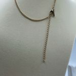 White House | Black Market WHBM “L” dangle rhinestone gold colored choker . Photo 2