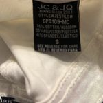 Metallic Disco iridescent cream shimmer high waist jeans. Small. NWOT Size undefined Photo 5