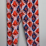 Agnes & Dora  Orange and Blue Patterned Leggings Photo 0