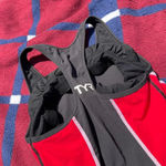 Tyr. tank top with a back pocket 
Women’s size small S
Color: red black Photo 2