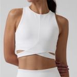 Athleta  Conscious Cut Out Crop Top Crossover Sports Bra D-DD Cups in White Photo 0