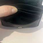 Michael Kors black small leather wallet. In good pre loved condition. Photo 9
