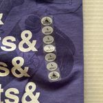 Disney NWT ’s Ariel Mermaid lyric gizmo purple t-shirt, size large. Photo 1