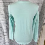 Under Armour women S heat gear loose Longsleeve scoopneck top light blue Photo 9