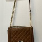 Bebe -  brown quilted pattern purse with gold strap crossbody Photo 1