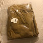Free People NWT  Movement Circle Back Jogger Pants Mustard Yellow Photo 3