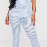 Pretty Little Thing  Light Blue Textured Flare Strapless Jumpsuit Photo 0