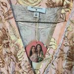 Agua Bendita  Pink and Brown Floral Wrap Romper Photo 1