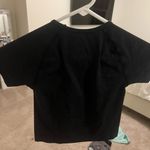 black tight fitted athletic top Size XS Photo 1