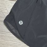 Lululemon Hotty Hot Short 4" Black Running Shorts OVA Logo Size 4 Tall Photo 2