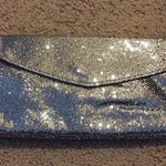 Forever 21 NWT silver sparkle mesh clutch. Photo 0