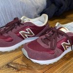 New Balance 311 Maroon And Rose Gold Sneakers Photo 0